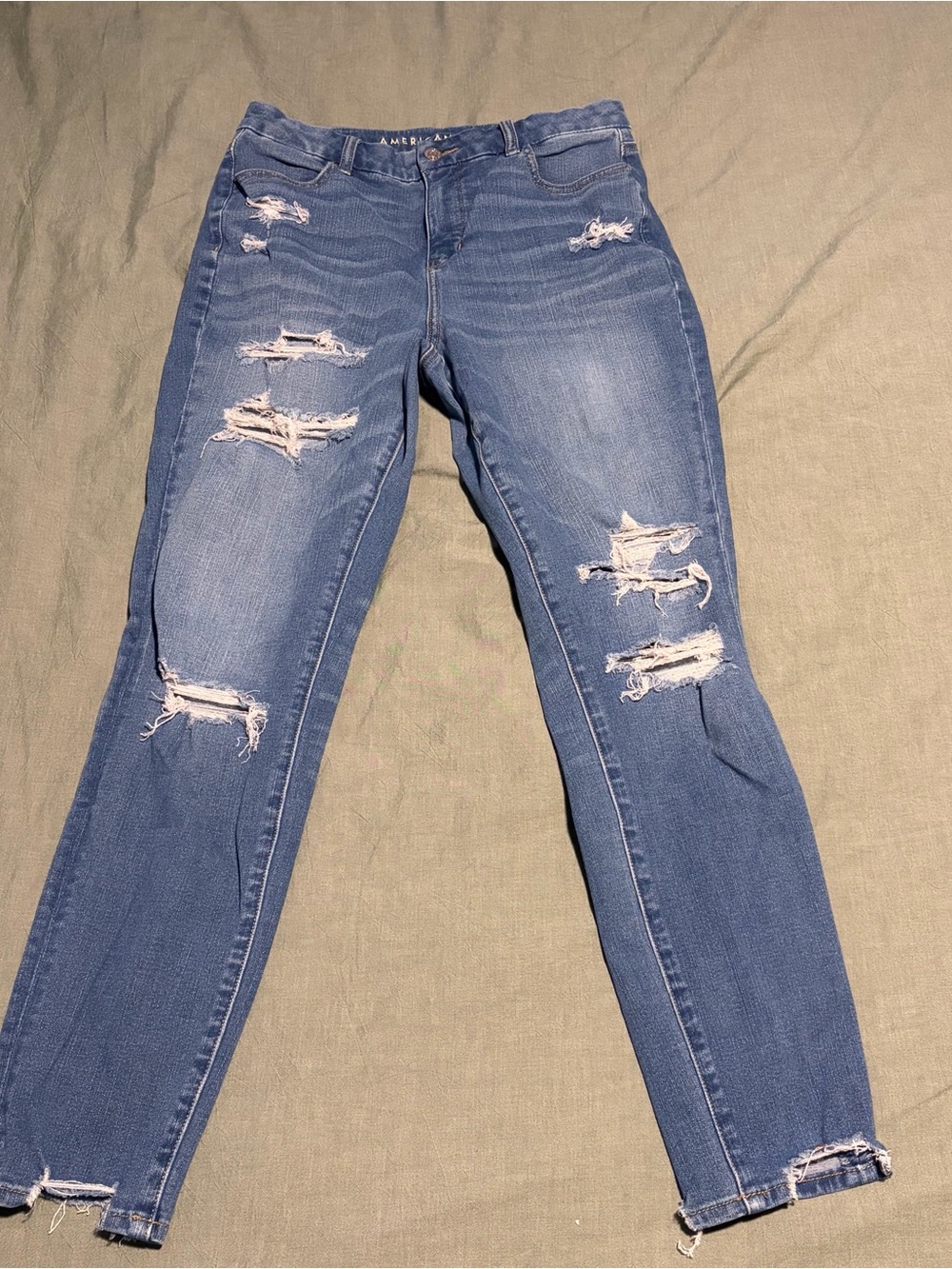 American Eagle Outfitters Medium Blue Ripped Skinny Jeans